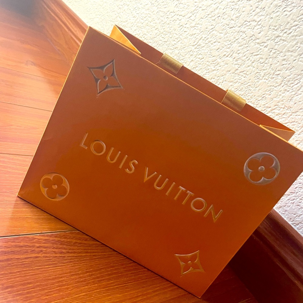 Louis Vuitton shopping bag with gold details